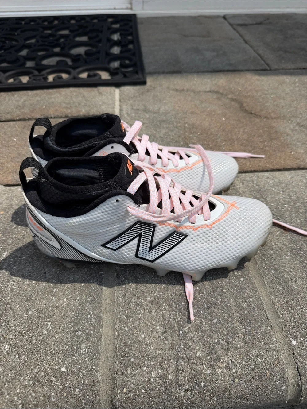 New Balance freeze cleats Women’s size 9